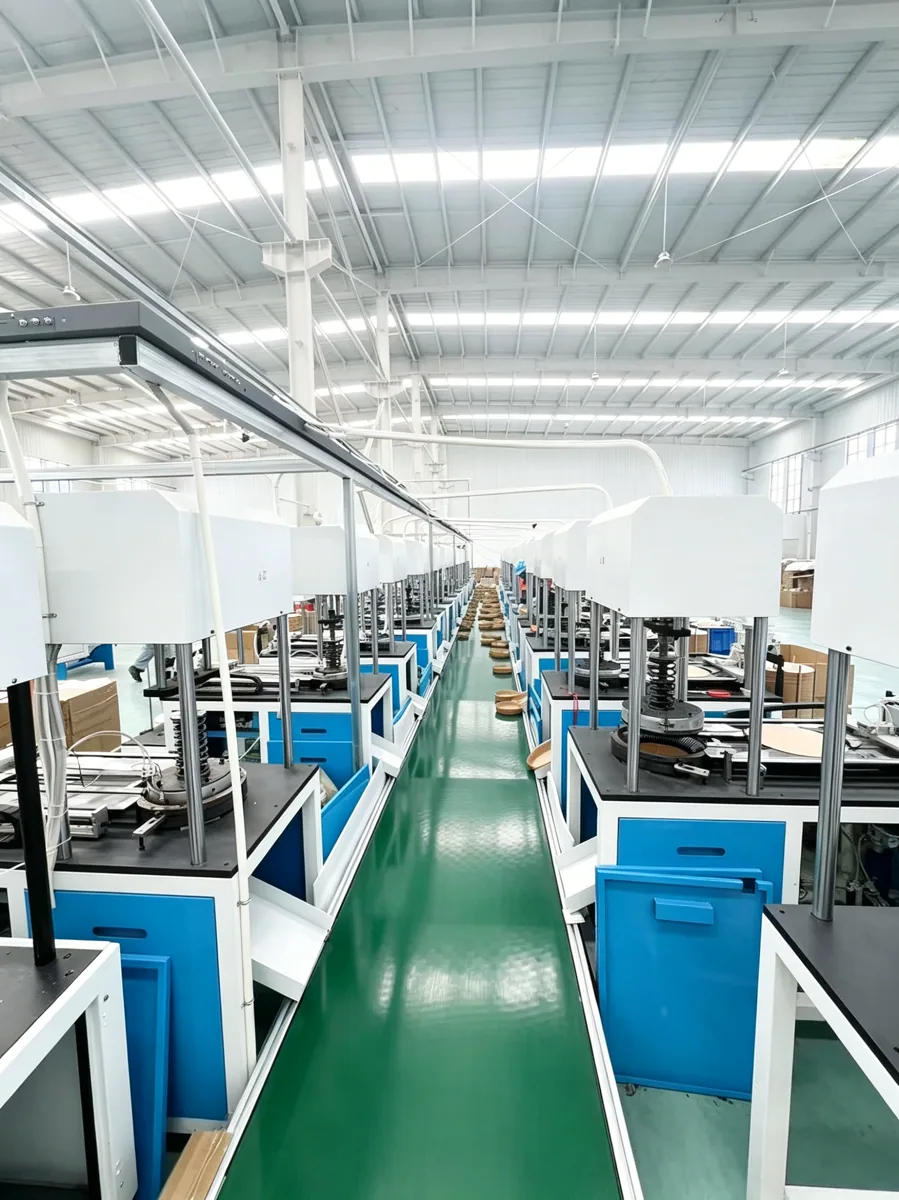 Rows of paper forming equipment inside the Zhongji Paper workshop