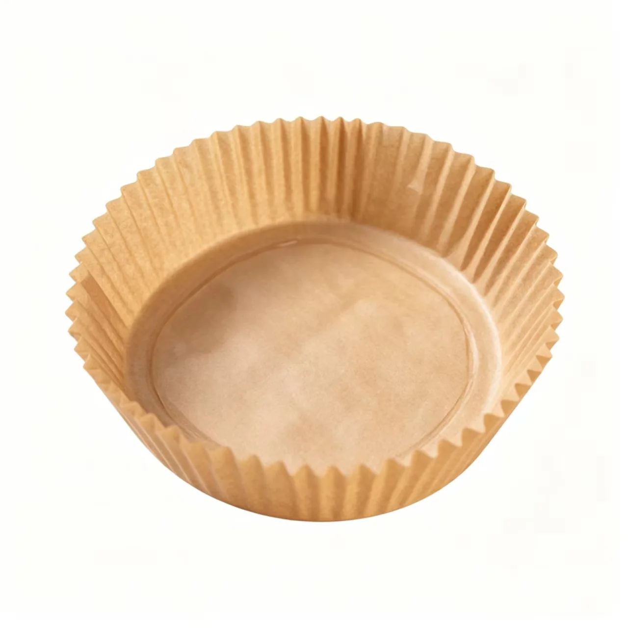 Round brown pleated paper air fryer liner on a white background
