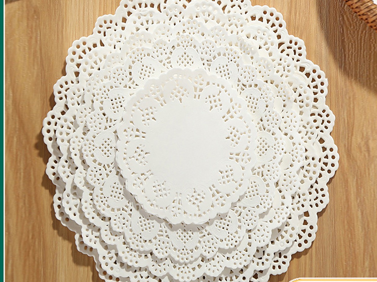 White lace paper doilies shown as a complete stacked product