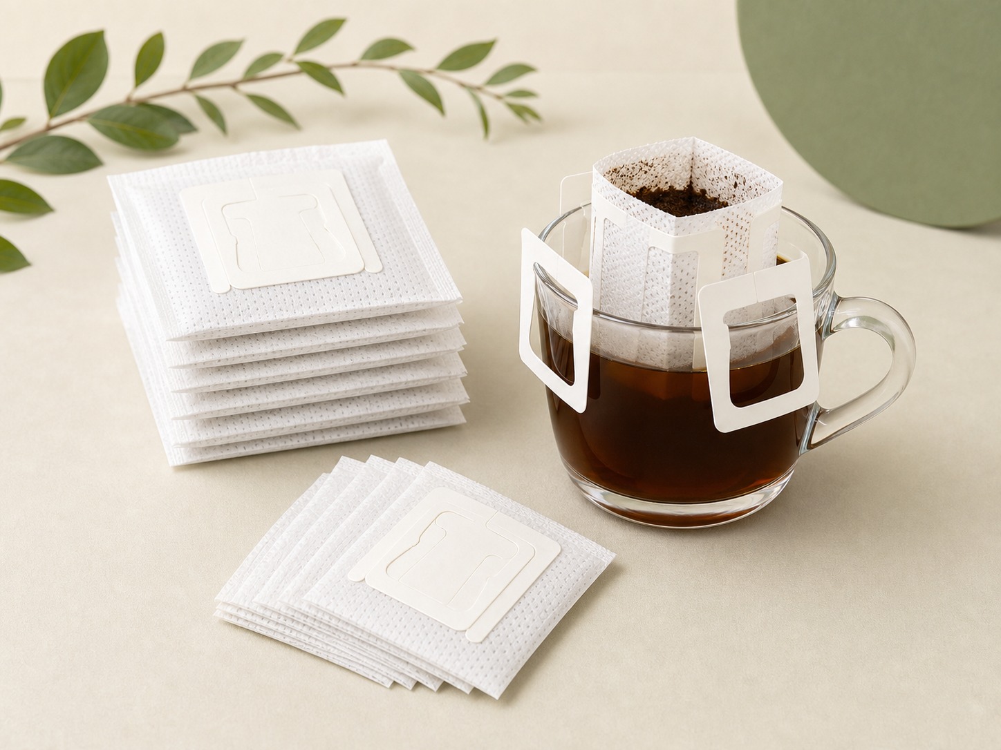 Complete hanging ear drip coffee filter bags with stack and cup fully visible