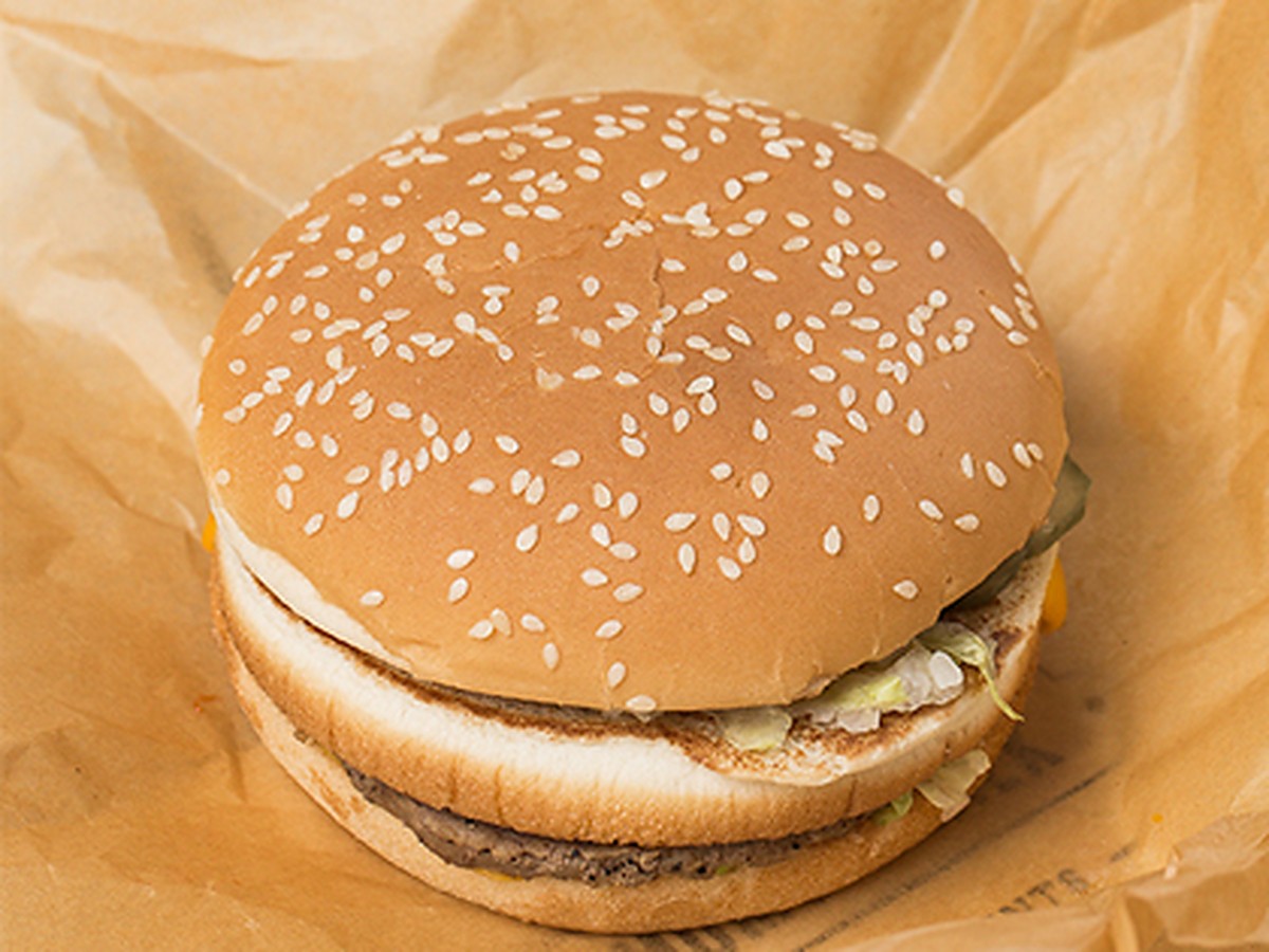 Burger wrapped with natural greaseproof food paper